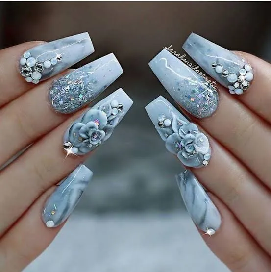 Grey marble coffin nails with 3D blue roses, pearls, crystals, and glitter accents