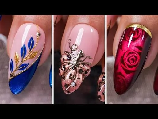 Three couture-level nail designs: a blue and gold leaf motif, a leopard-print butterfly charm, and deep red rose nail art