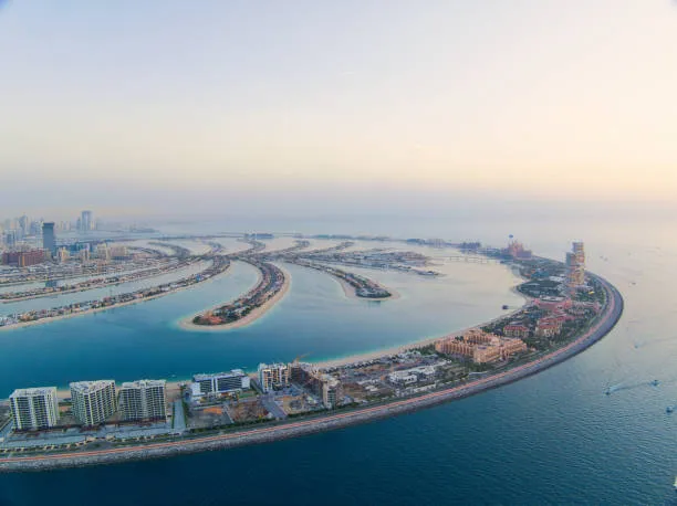 Aerial view of Dubai's Palm Jumeirah at sunset